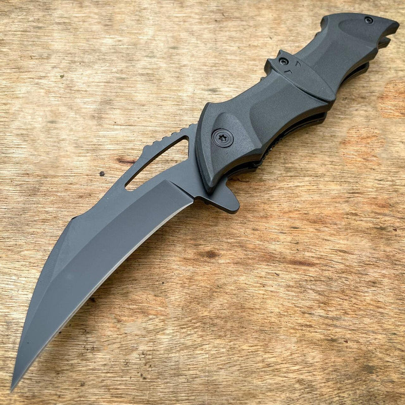 https://megaknife-wholesale.com/cdn/shop/products/blade-addict-knives-black-8-fantasy-bat-spring-assisted-open-folding-pocket-knife-dark-knight-joker-blade-36349547315414_800x.jpg?v=1668121711